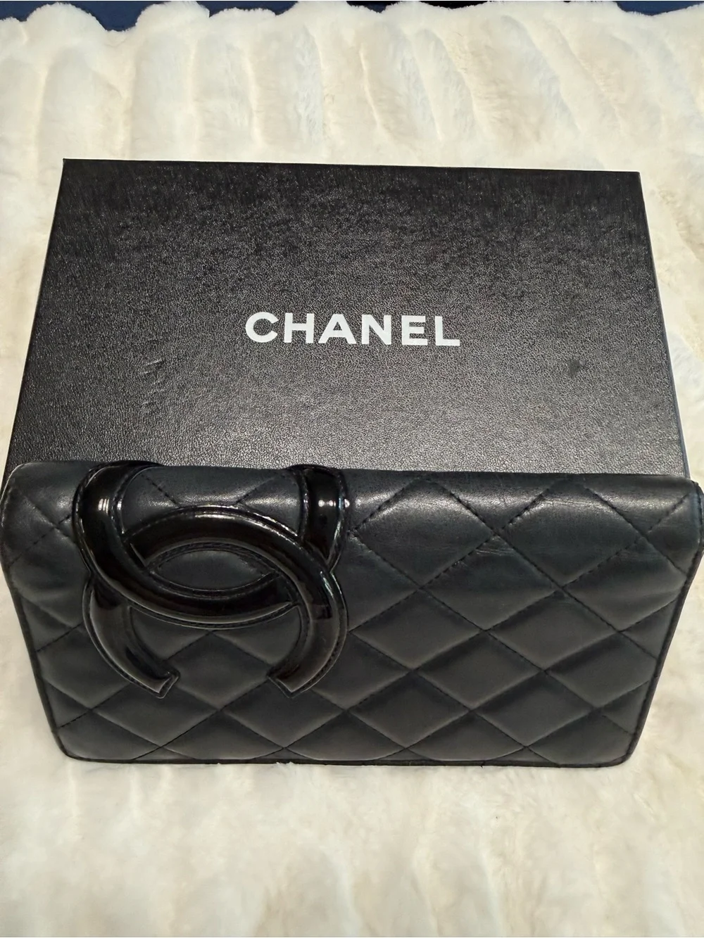 CHANEL Black Quilted Leather Clutch with Oversized CC Accent